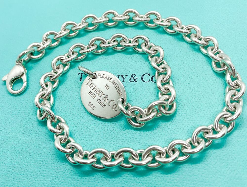 Return to Tiffany & Co Sterling Silver Oval Tag Choker Pendant Necklace 15"